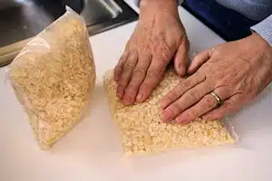 filling bags with beans